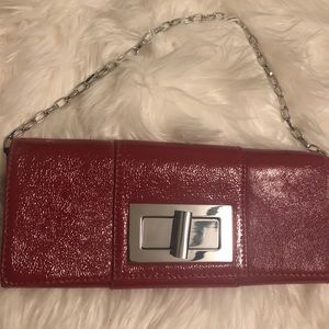 Never used red clutch with silver chain